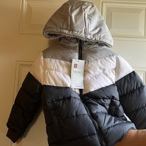 Navy blue children’s winter coat.
